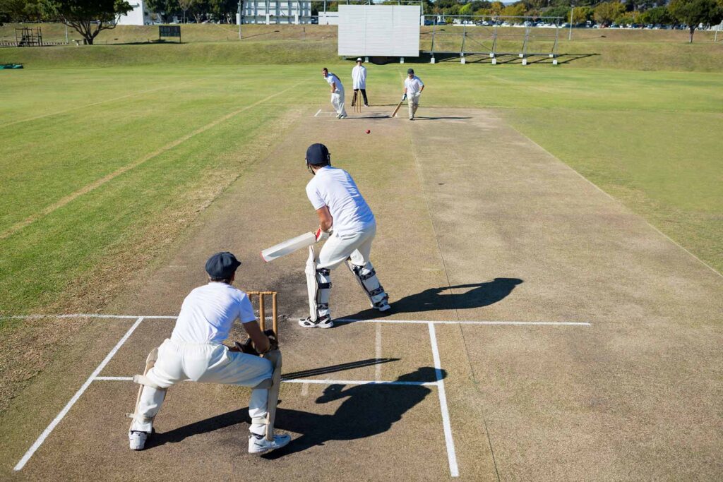 high-angle-view-of-cricket-match-at-field-2025-04-05-02-17-28-utc.jpg