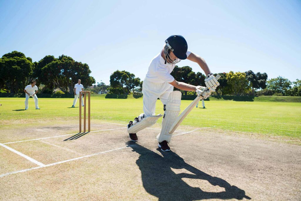 young-man-playing-cricket-at-field-against-clear-s-2025.jpg